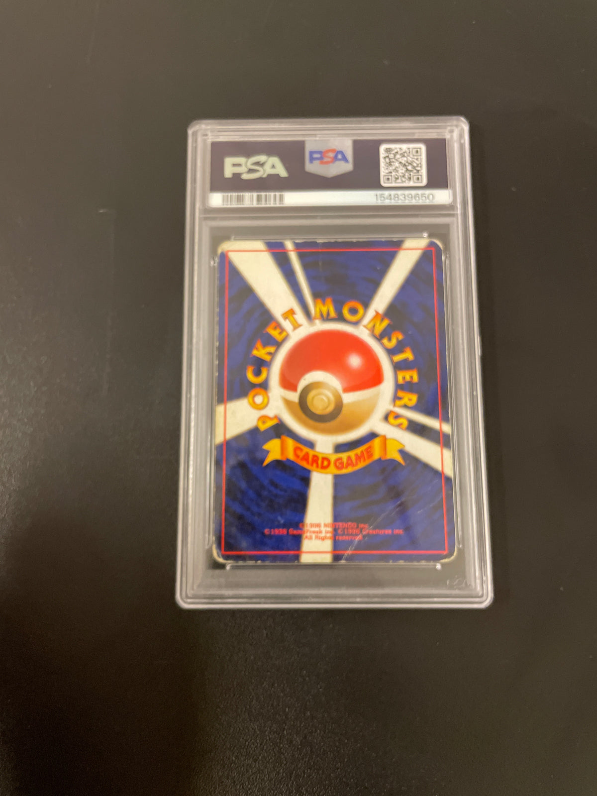 Maneton Holo Japansk Vintage #82 fra 1996 PSA 2